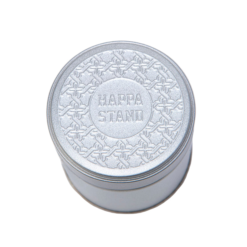 Silver container with 'Happa Stand' embossed on a light gray background