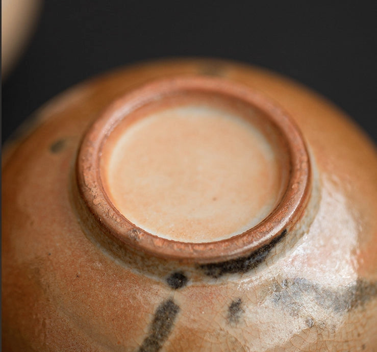 Detail image of the bottom of a tea cup.