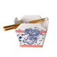 White takeout container with blue dragon design, wooden chopsticks, on a marble surface.