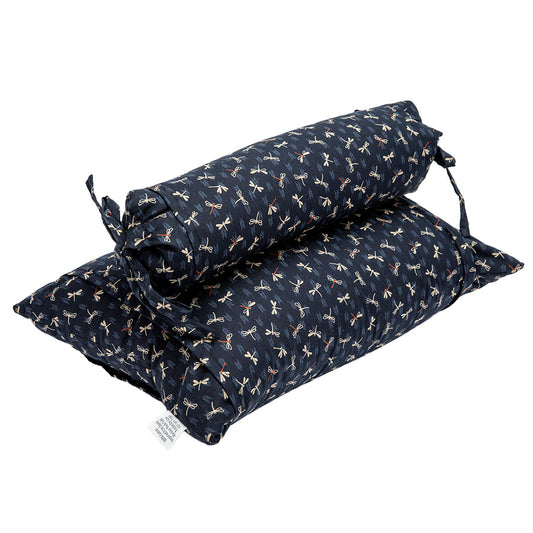 Two navy blue pillows with white patterns on a white background