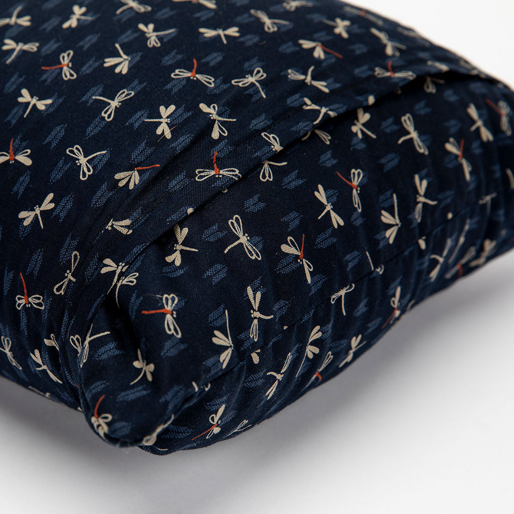 Navy blue fabric with dragonfly pattern on a white background