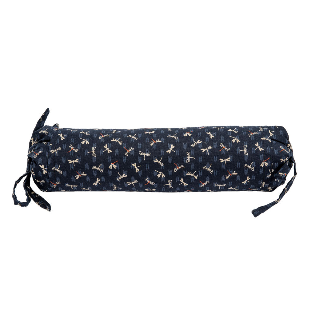 Navy cylindrical pillow with dragonfly pattern on a white background