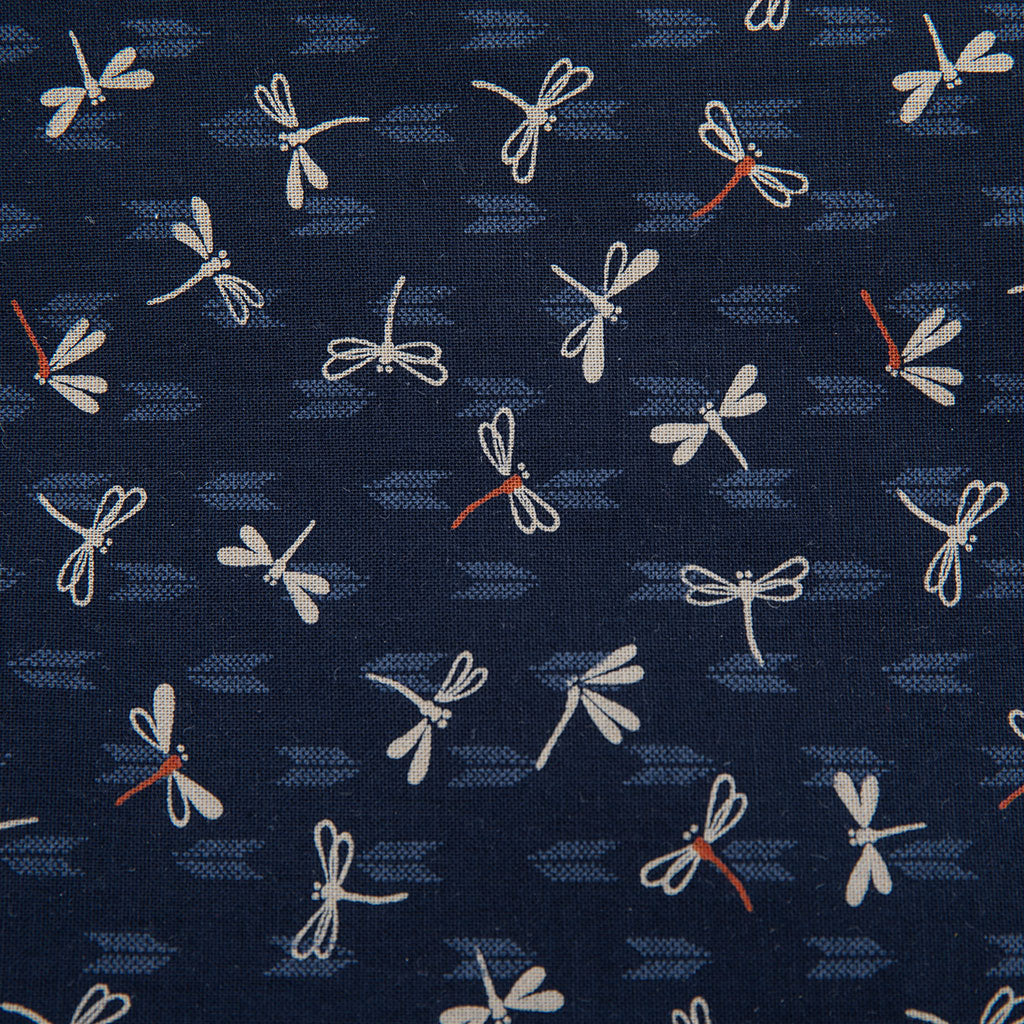 Navy fabric with white and red dragonfly pattern