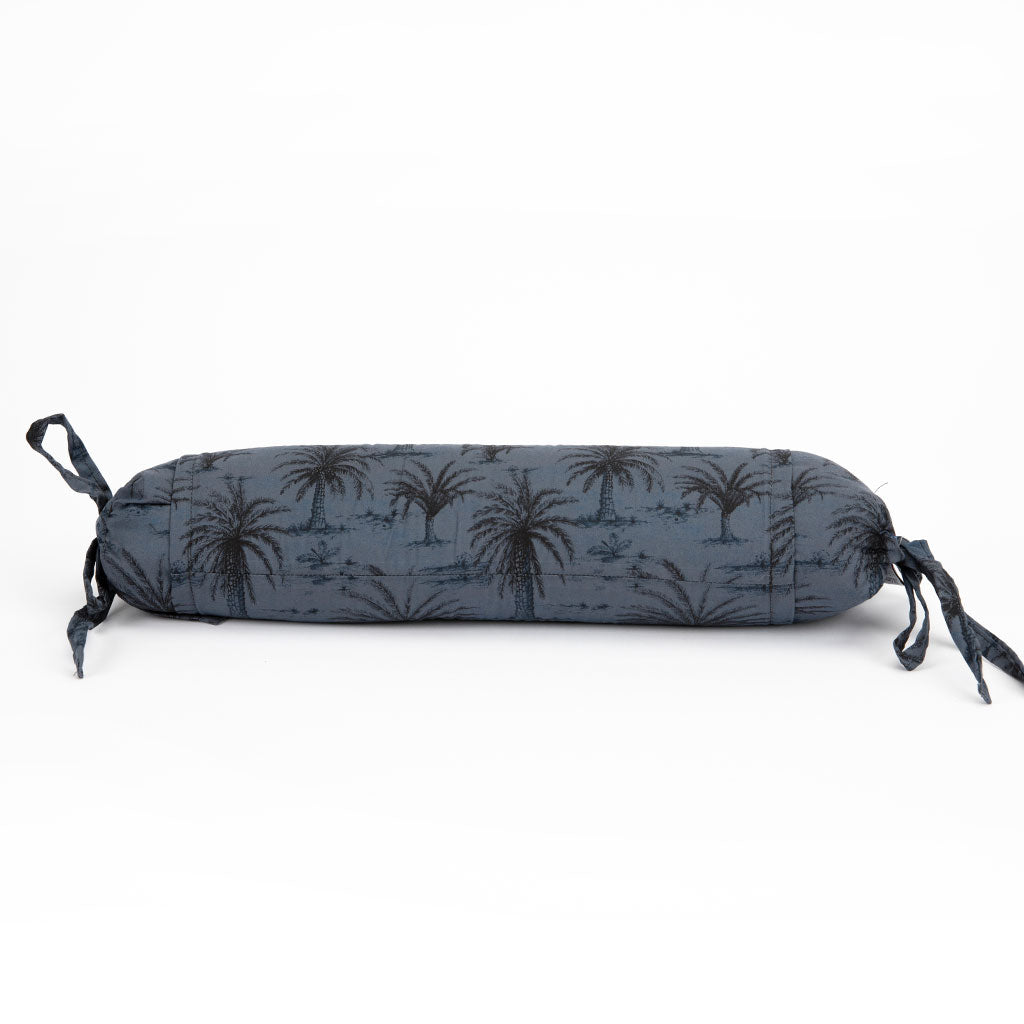 Buckwheat hull neckroll with white and black design on a white background