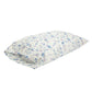 A rectangular pillowcase featuring a delicate blue and purple floral pattern on a white background, shown on a plain white studio background.