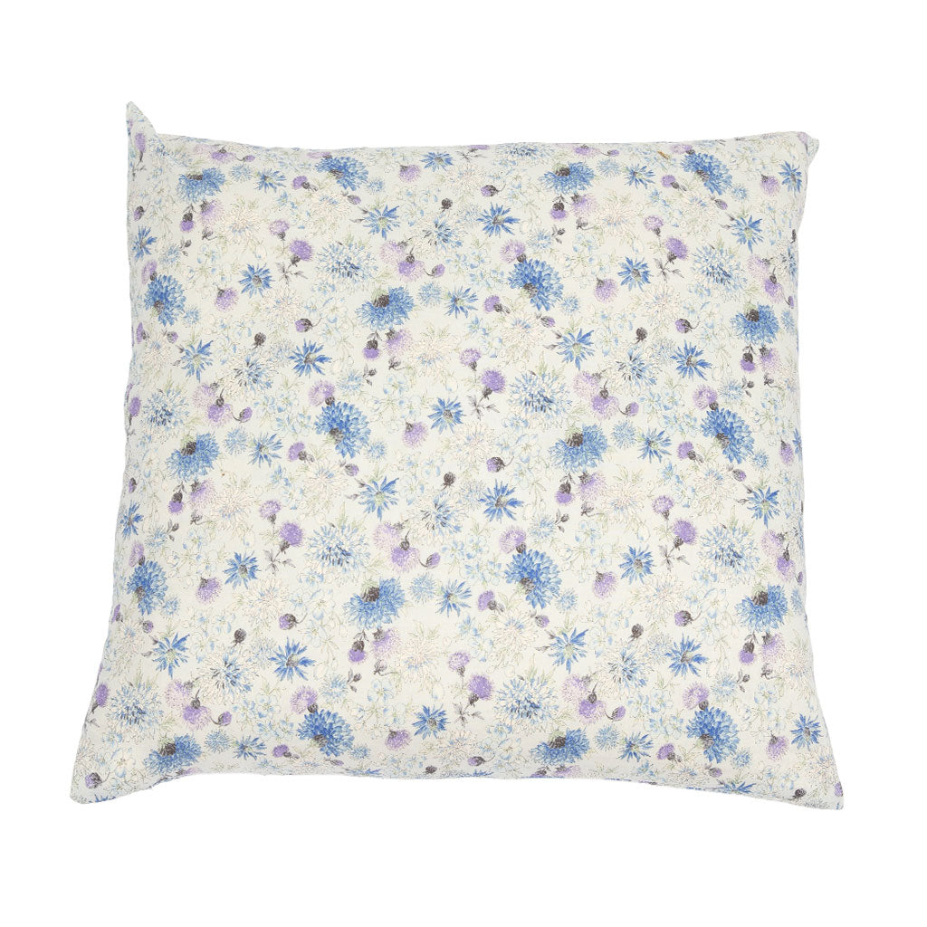 A square zabuton floor pillow featuring a delicate, all-over floral print in shades of blue and purple on a warm cream background.