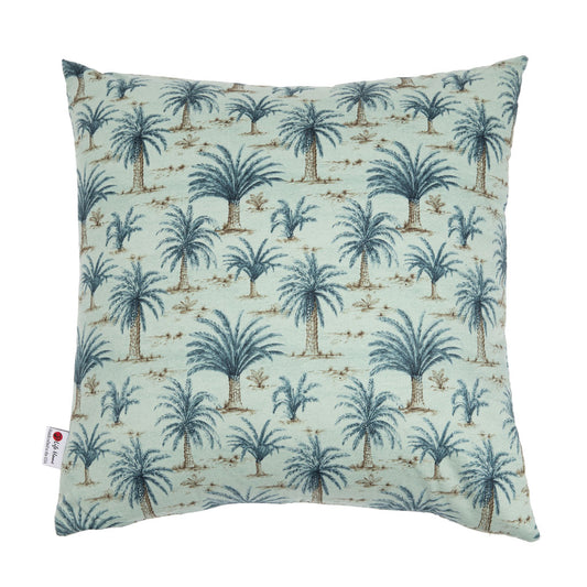 A square throw pillow featuring a repeating palm tree pattern in blue and brown on a pale mint green background, shown against a plain white studio background.