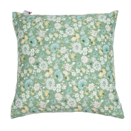 A square throw pillow featuring a dense floral print on a sage green background with white, light blue, and yellow flowers, shown against a plain white background.