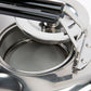Close-up of a silver teapot with open lid