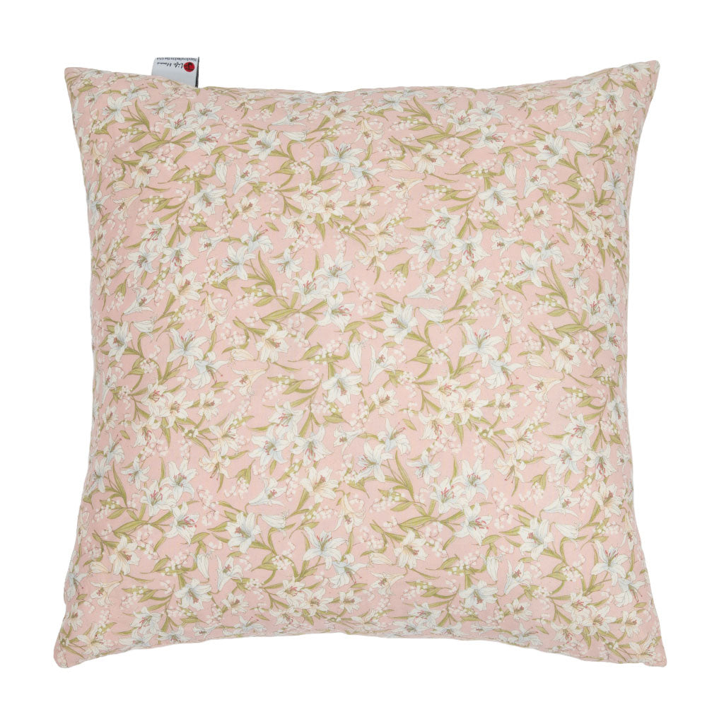 A square decorative throw pillow featuring a delicate floral print in soft pink, white, and olive green, shown against a plain white background.