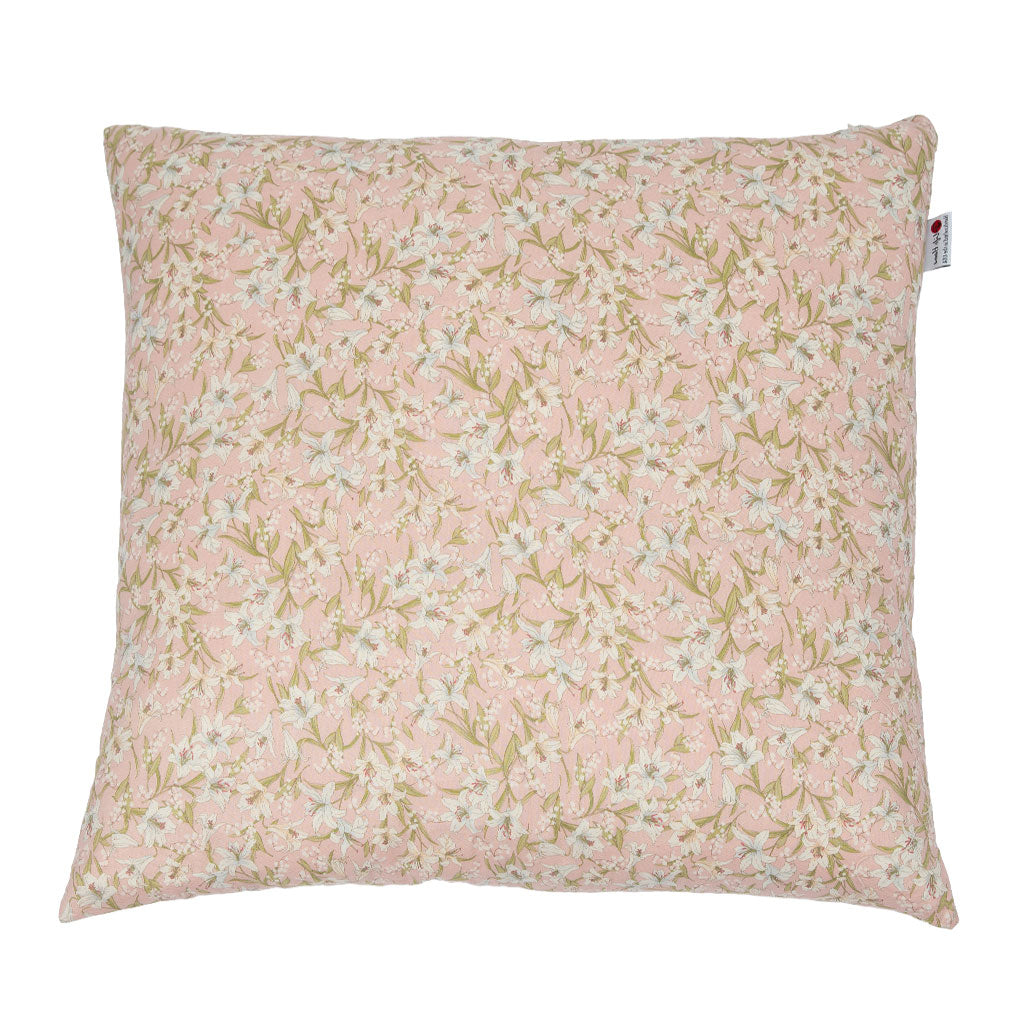 A square decorative throw pillow featuring a delicate pink and beige floral pattern with small white blossoms, shown against a plain white background.