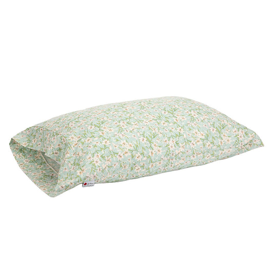 A rectangular pillowcase with a light sage green background and a delicate white and pink floral print with green stems, shown on a plain white background.