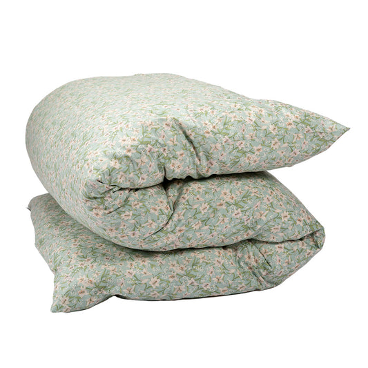 A shikifuton mattress with a light sage green and white floral pattern, isolated on a white background.