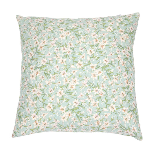 A square throw pillow featuring a delicate floral print with white blossoms and green leaves on a soft mint green background, isolated on a white studio background.