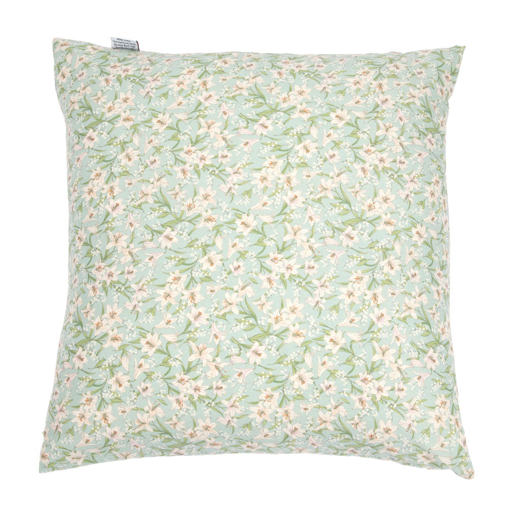 A square decorative throw pillow featuring a delicate floral print in sage green, mint, and soft pink on a white background.