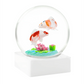 Glowing snow globe with two goldfish and a lily pad on a white background