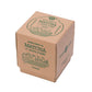 Paper box with green matcha tea branding on a white background