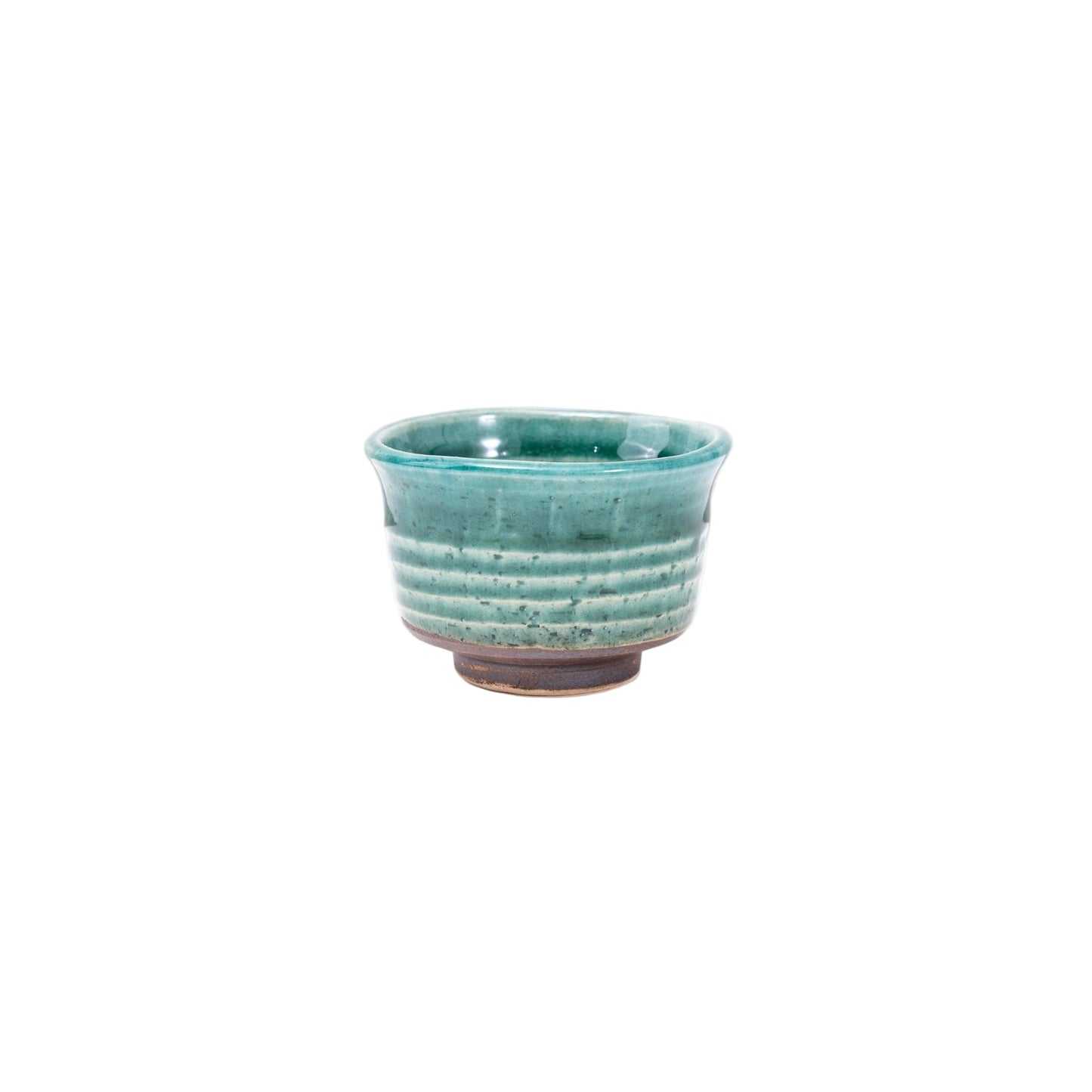 Green ceramic cup on a white background