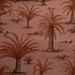 A close-up of a fabric pattern featuring brown palm trees and small desert plants on a dusty pink background.