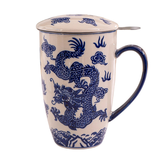 A tall ceramic mug with a matching lid and metal tea infuser, decorated with a blue dragon and cloud pattern on a cream-colored glaze, isolated on a white background.