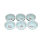 Set of six small ceramic bowls with fish design on a white background